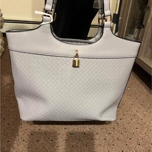 Grey purse with tags brand new